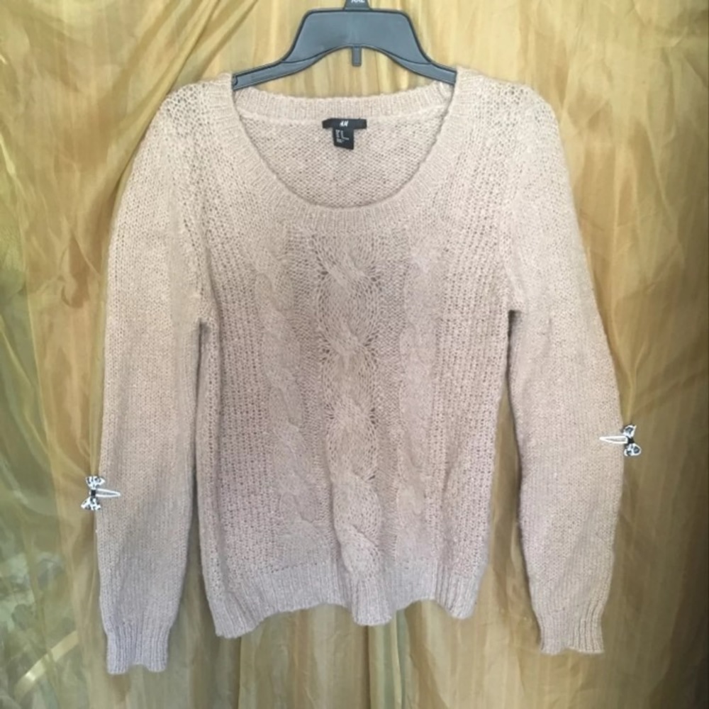 Beige knitted sweater